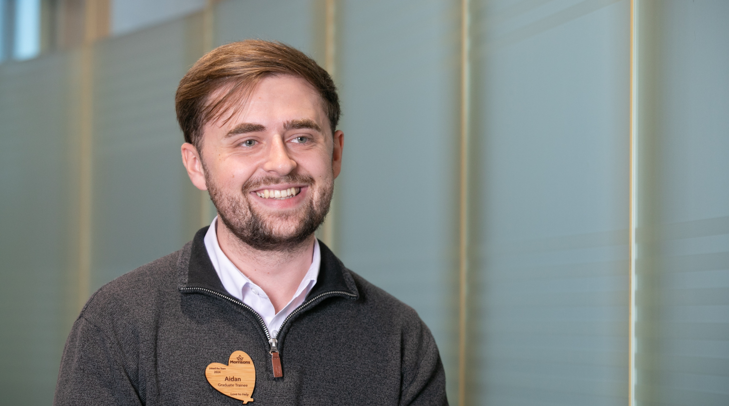Industrial placement colleague smiling in office
