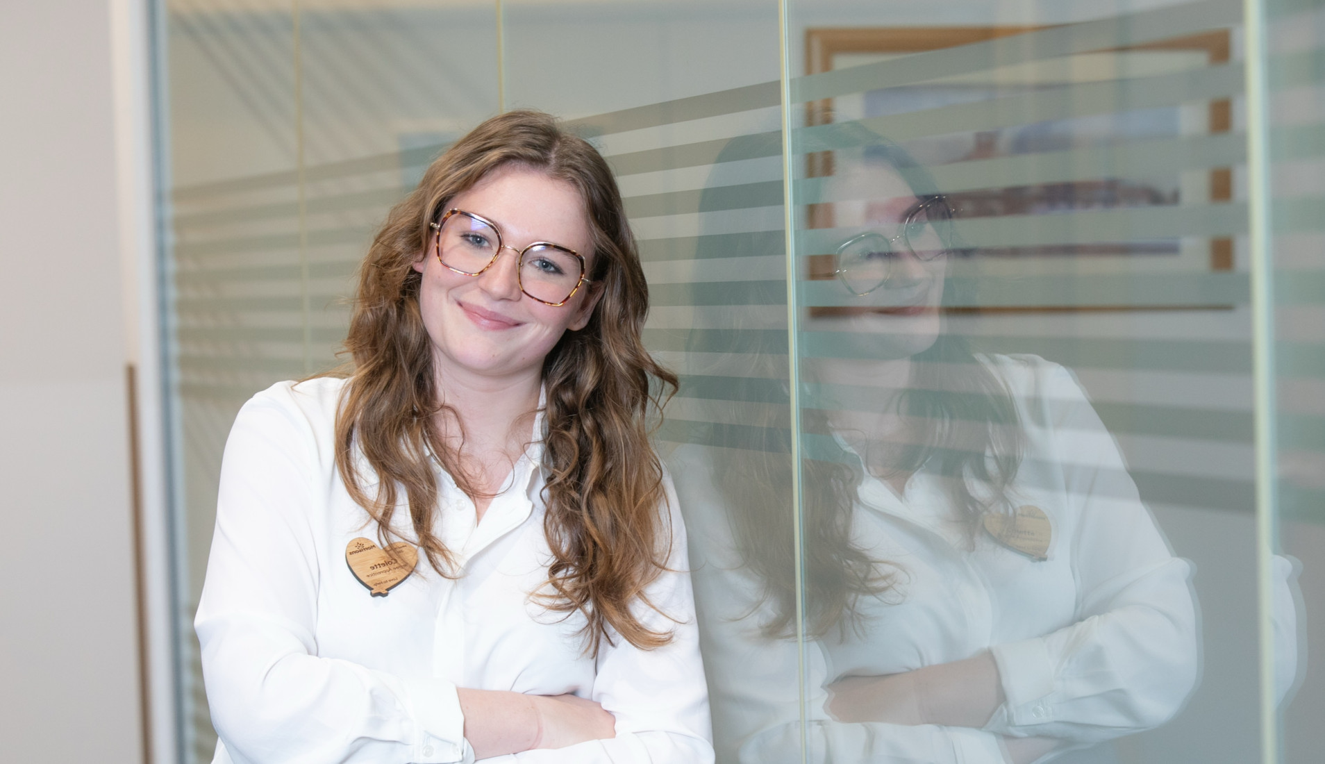 Smartly dressed female colleague in office